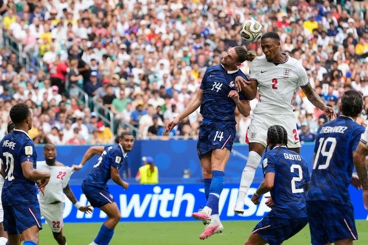 نتائج كأس العالم لكرة القدم 2026: إنجلترا 6-4 فرنسا: ساكا يسجل ثلاثية، مبابي يتجاوز ميسي، إنجلترا تفوز بمباراة تحديد المركز الثالث. Kết quả bóng đá World Cup 2026: Anh 6-4 Pháp: Saka lập hat-trick, Mbappe vượt Messi, tuyển Anh thắng trong trận tranh hạng Ba